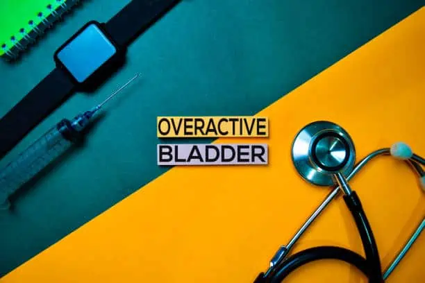 Overactive Bladder text on top view color table and Healthcare/medical concept.