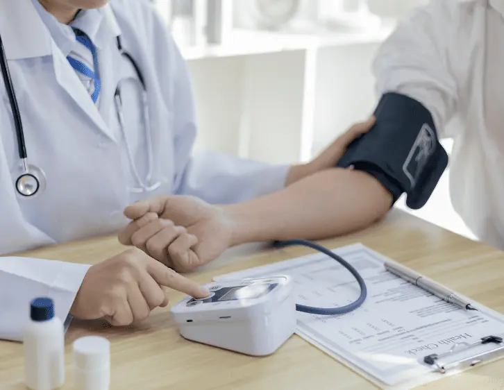 A patient measuring blood pressure